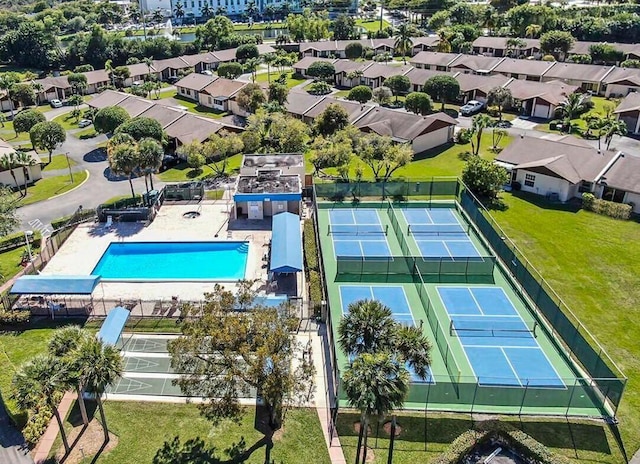 birds eye view of property with a residential view