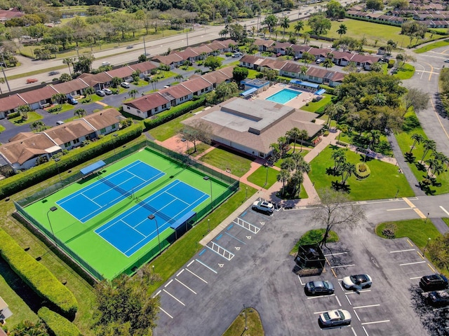 birds eye view of property with a residential view