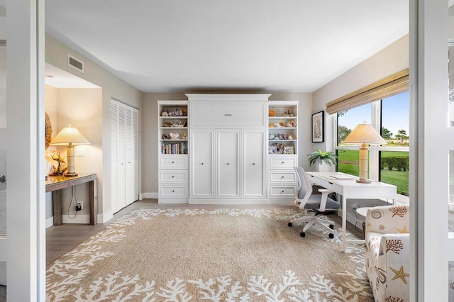 office featuring visible vents and baseboards