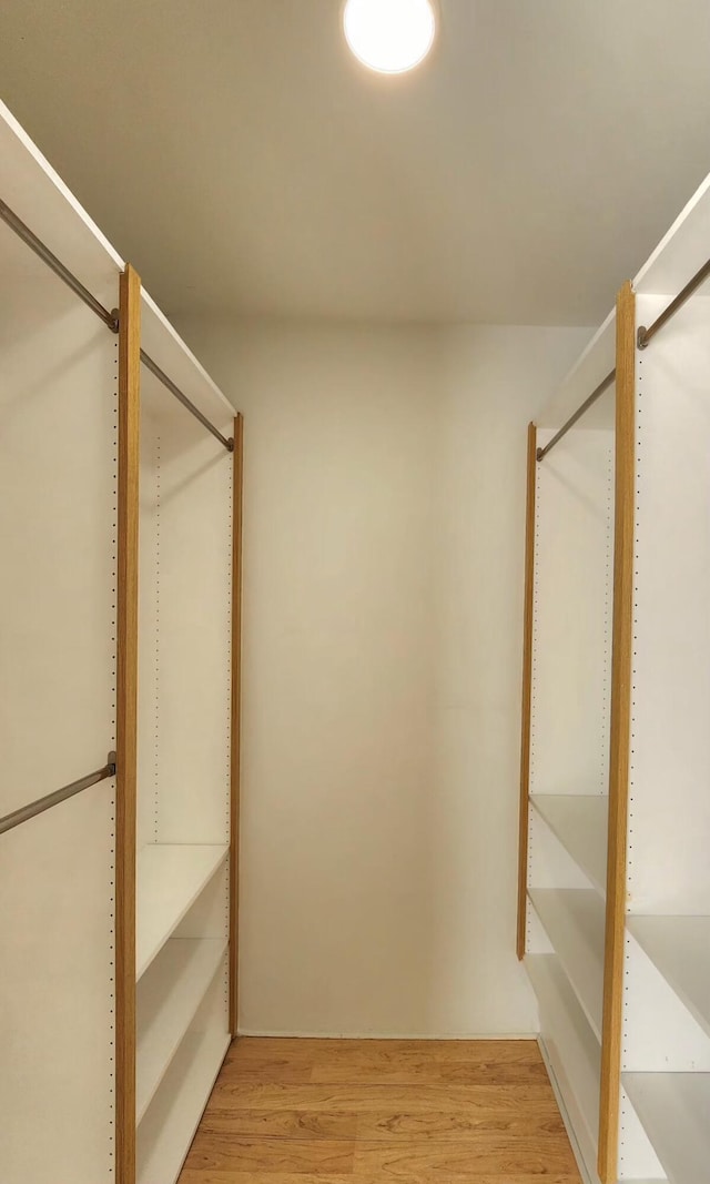 walk in closet featuring light wood-type flooring