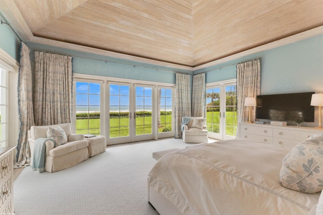 bedroom featuring a raised ceiling, wood ceiling, access to exterior, carpet, and french doors