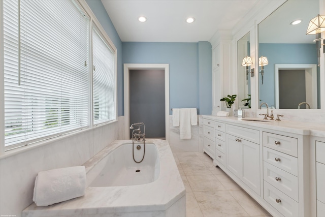 full bathroom with recessed lighting, tile patterned flooring, a washtub, and vanity