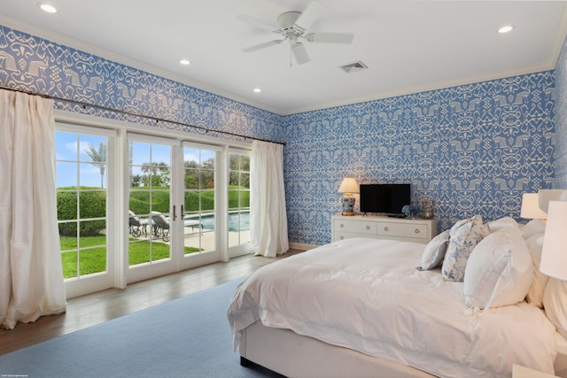 bedroom featuring access to exterior, french doors, crown molding, visible vents, and wallpapered walls