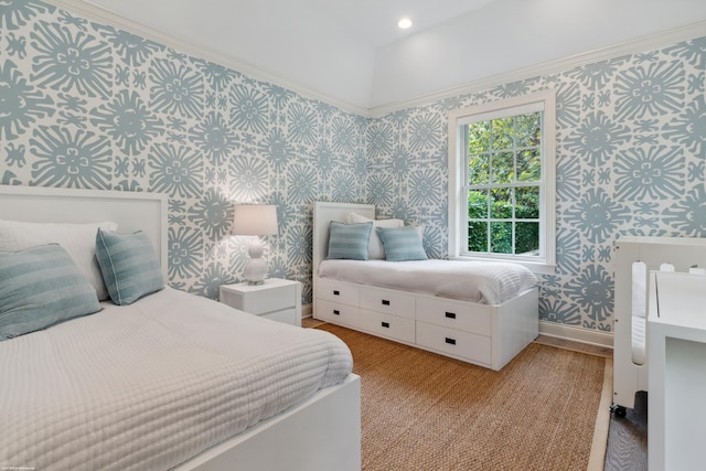 bedroom with wallpapered walls and baseboards