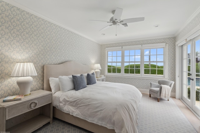 bedroom with access to outside, ornamental molding, and wallpapered walls