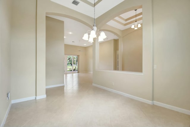 9429 Lantern Bay Cir, West Palm Beach, FL 33411 - tiled spare room with a chandelier, arched walkways, baseboards, and recessed lighting
