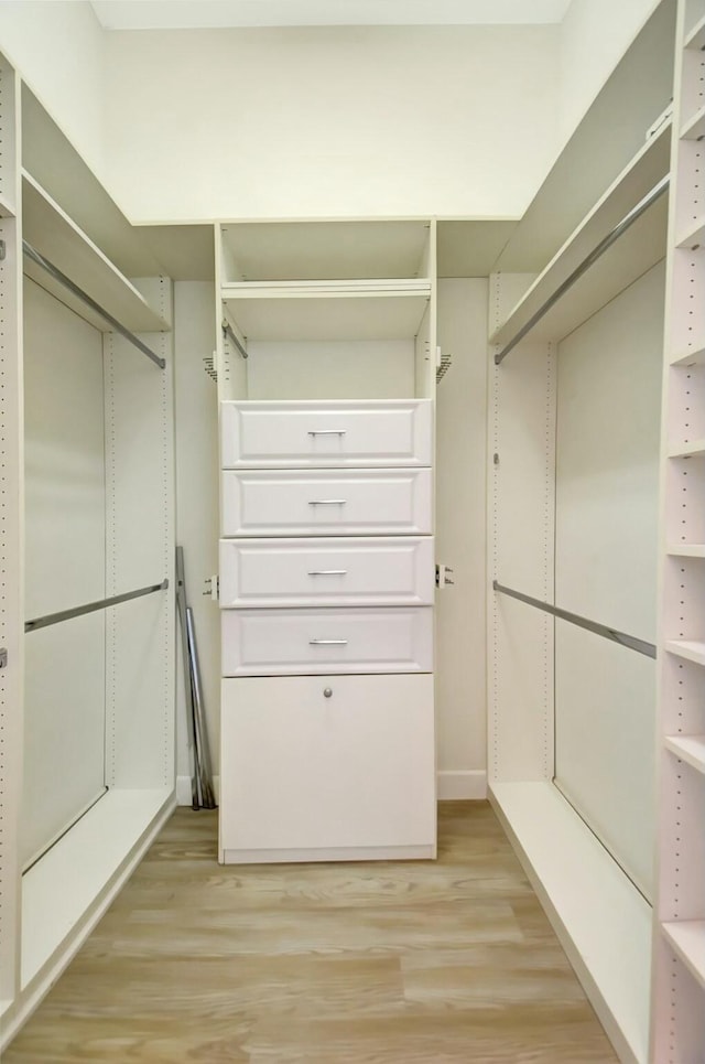 9429 Lantern Bay Cir, West Palm Beach, FL 33411 - spacious closet with light wood finished floors