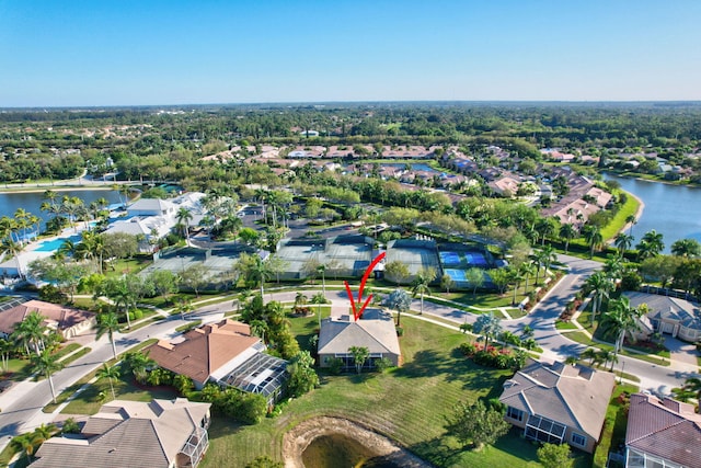 aerial view featuring a water view and a residential view