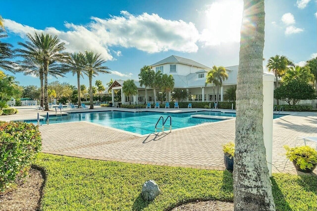 community pool with a patio