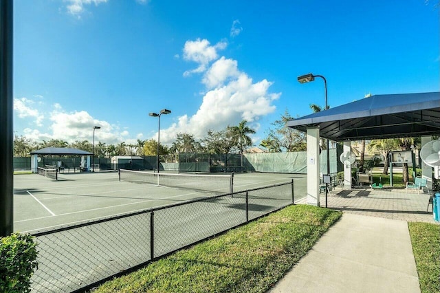 9429 Lantern Bay Cir, West Palm Beach, FL 33411 - view of tennis court featuring a gazebo