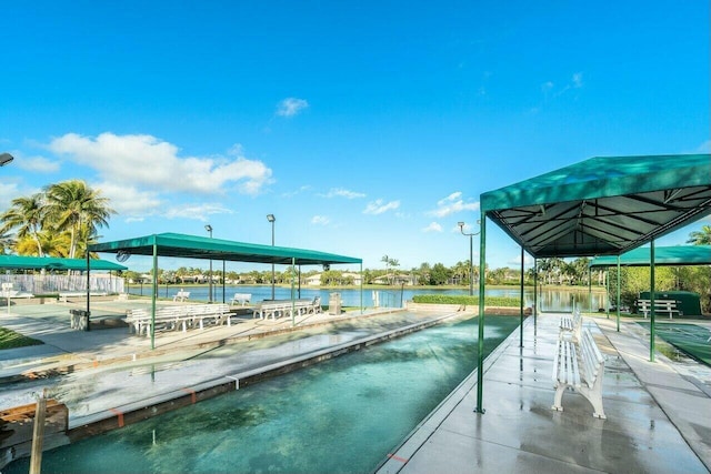 dock area featuring a water view