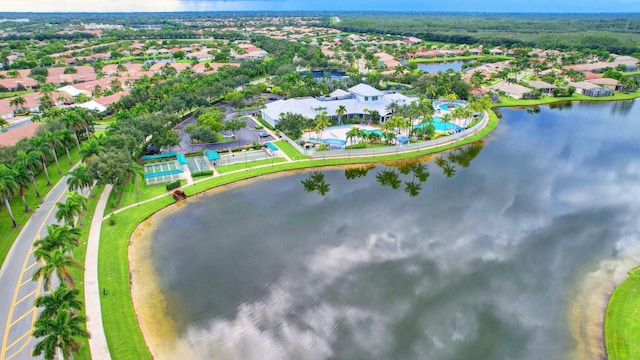 bird's eye view with a residential view and a water view