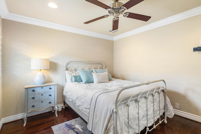 bedroom featuring baseboards, hardwood / wood-style floors, and crown molding