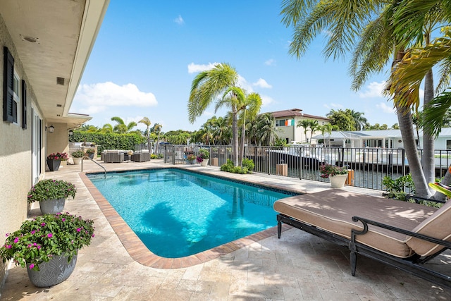 view of swimming pool with a fenced in pool, a patio, fence, central air condition unit, and outdoor lounge area