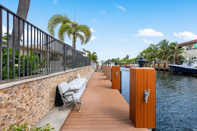 view of dock with a water view