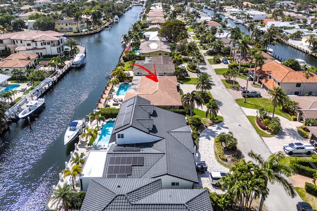 aerial view with a water view and a residential view