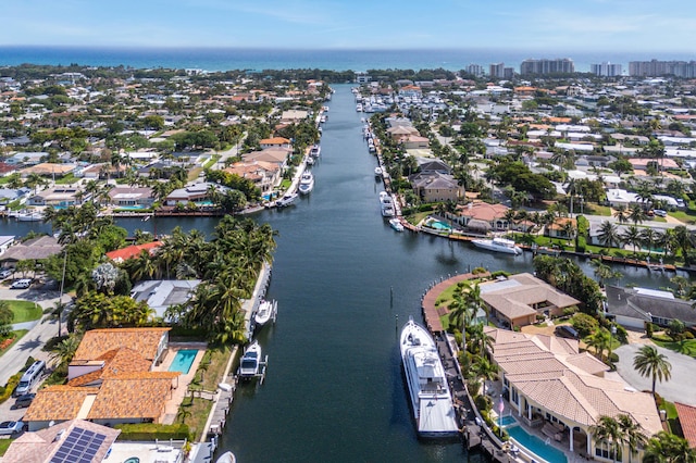 birds eye view of property featuring a residential view and a water view