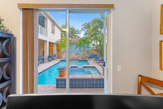 view of pool featuring a pool with connected hot tub