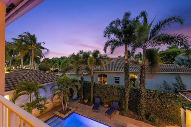 view of pool with a patio area and a fenced in pool