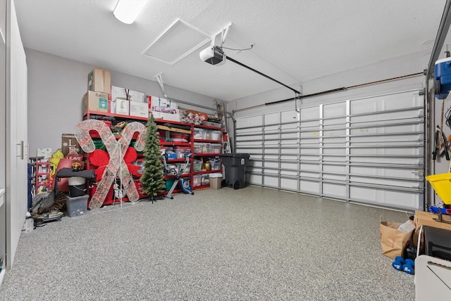garage featuring a garage door opener