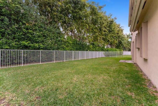 view of yard featuring a fenced backyard