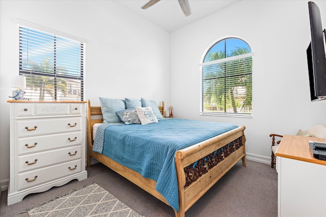 bedroom with lofted ceiling, carpet flooring, ceiling fan, and baseboards