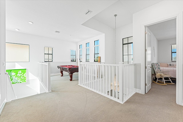 corridor with recessed lighting, baseboards, visible vents, and carpet flooring