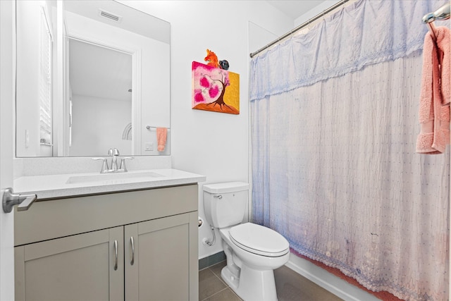 full bath with visible vents, toilet, curtained shower, tile patterned flooring, and vanity