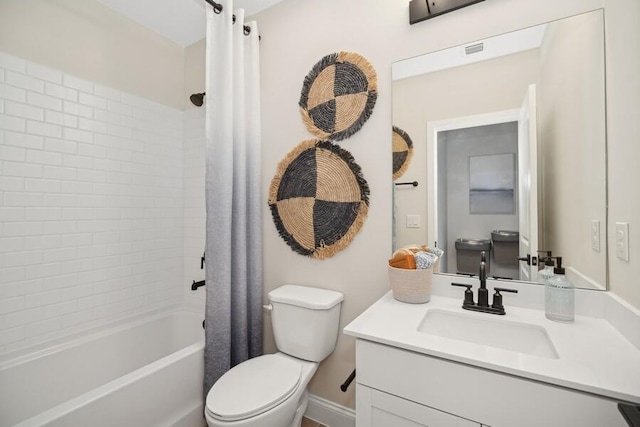 full bath featuring visible vents, shower / bath combo with shower curtain, toilet, and vanity