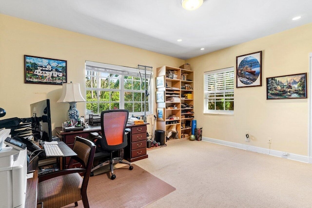 carpeted office space with recessed lighting and baseboards