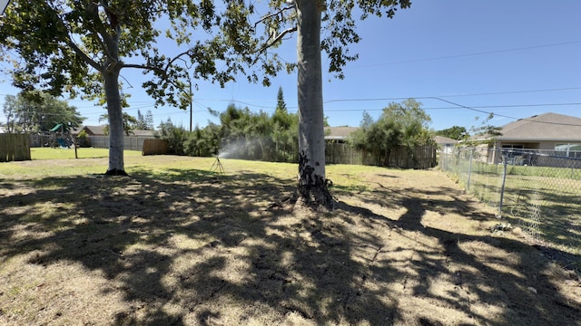 view of yard with fence