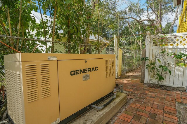 exterior details with fence and a power unit