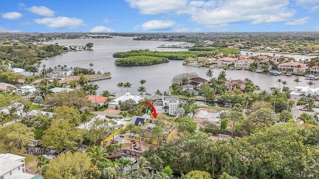 birds eye view of property featuring a water view and a residential view