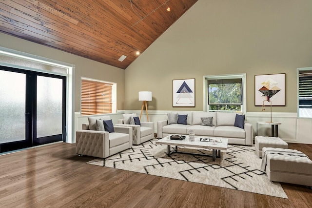 living room featuring a wainscoted wall, wood ceiling, french doors, wood finished floors, and high vaulted ceiling