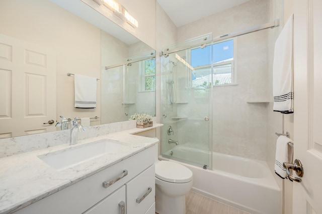 full bath featuring vanity, toilet, and enclosed tub / shower combo