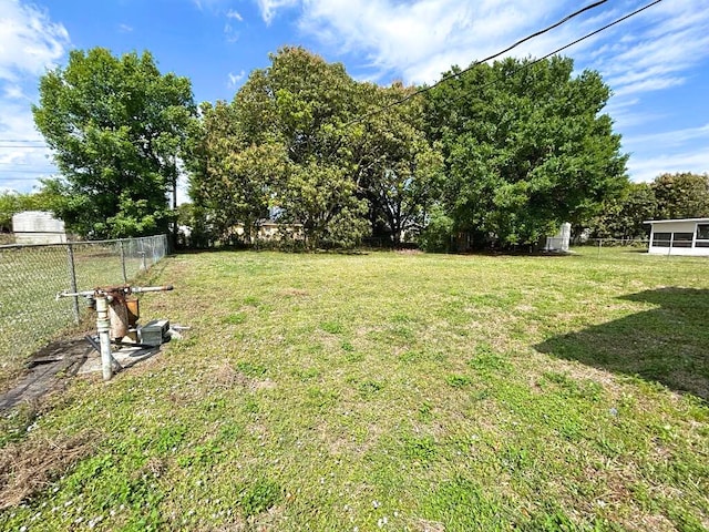 view of yard with fence