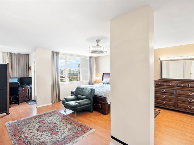 bedroom featuring light wood finished floors