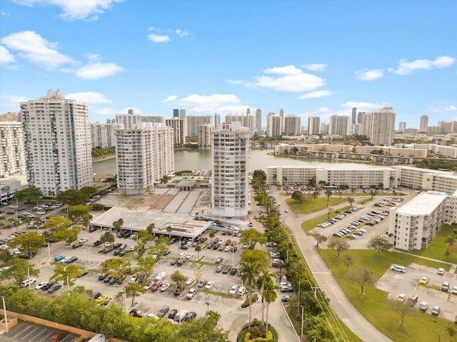 drone / aerial view with a water view and a view of city