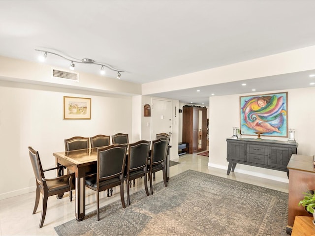 dining room with recessed lighting, visible vents, and baseboards