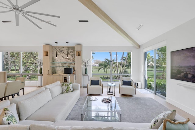 living room with light wood-style floors, visible vents, and vaulted ceiling with beams