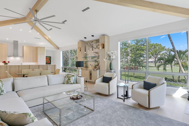 living area featuring lofted ceiling with beams, ceiling fan, visible vents, and recessed lighting