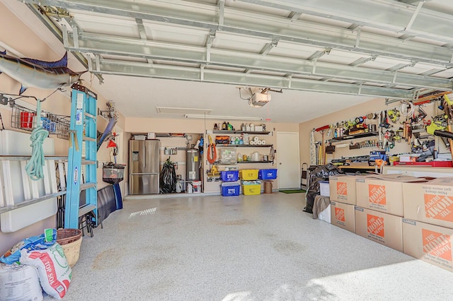 garage with water heater, stainless steel refrigerator with ice dispenser, a workshop area, and a garage door opener