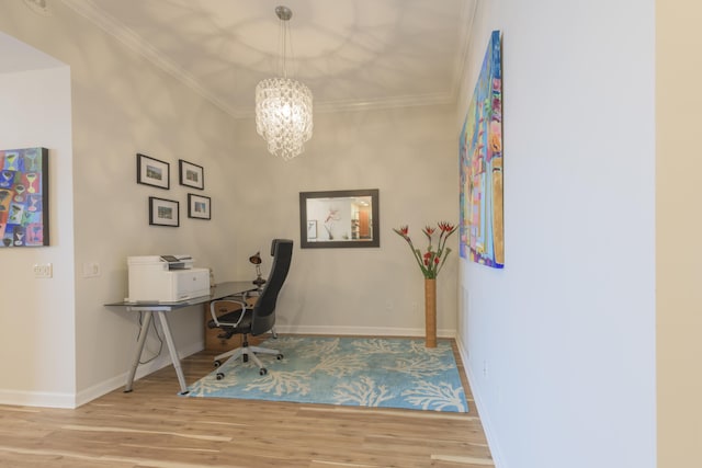 office area with ornamental molding, wood finished floors, and baseboards