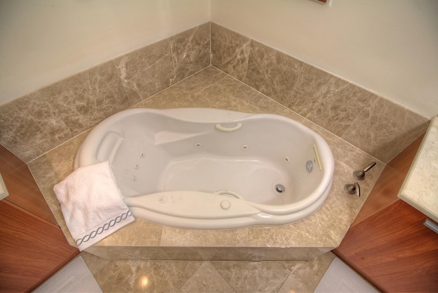 bathroom with a whirlpool tub