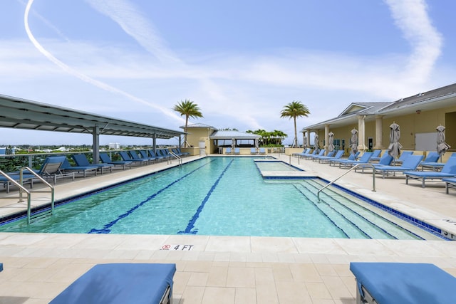 community pool featuring a patio area and a gazebo