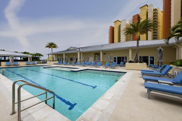 community pool featuring a patio