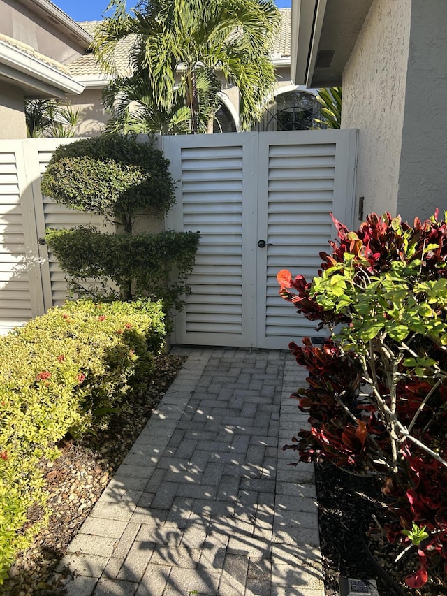 view of gate featuring fence