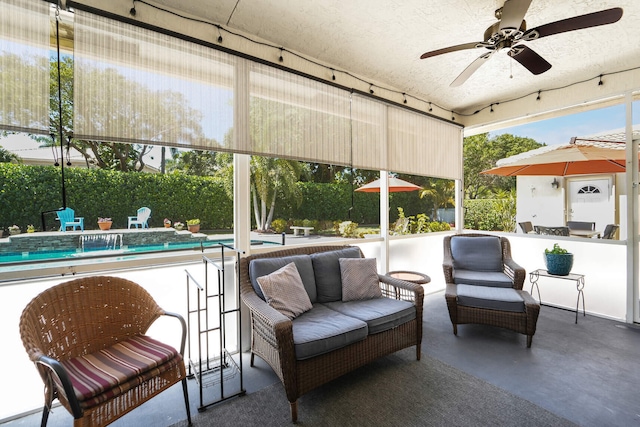 view of patio with ceiling fan, a fenced in pool, and an outdoor hangout area