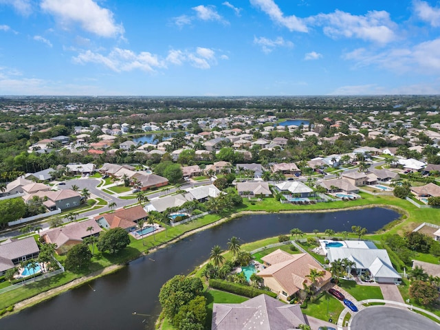 aerial view featuring a residential view and a water view