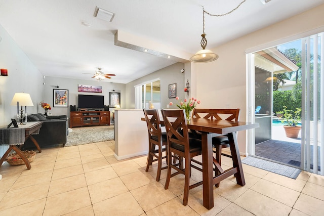 dining room with light tile patterned floors, ceiling fan, and visible vents